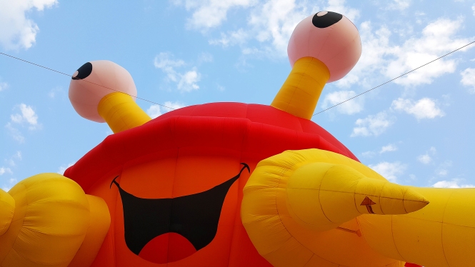 Adjusted One Year After Korea Crab Hot Air Balloon against blue sky